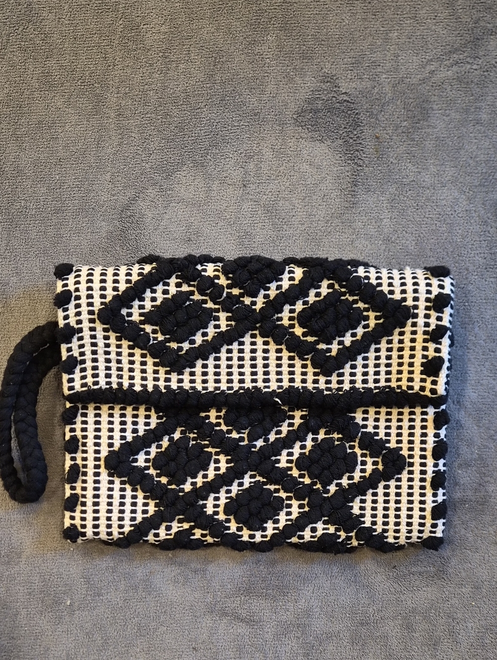 Elizabeth and James Black and White Woven Diamond Clutch